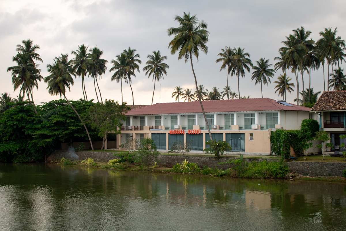 Mandara Resort beside a lagoon with palm trees, Mirissa, Sri Lanka