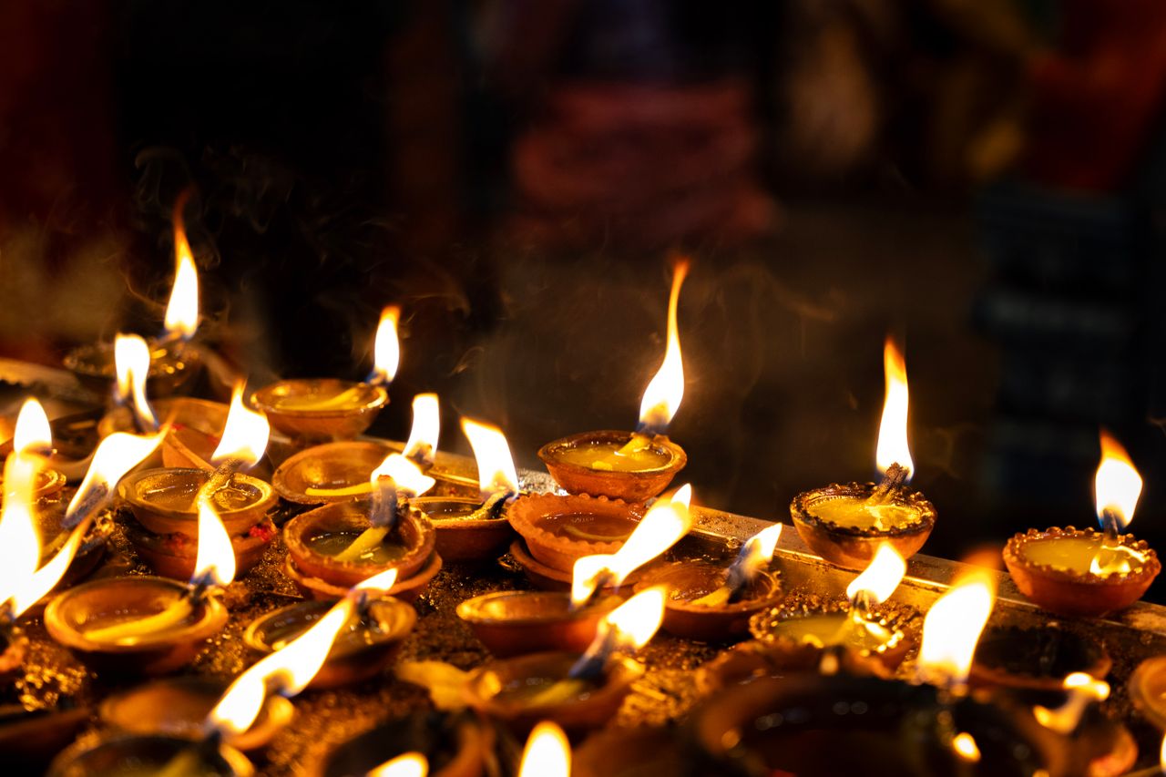 Rows of lit oil lamps for a Hindu festival, Sri Lanka