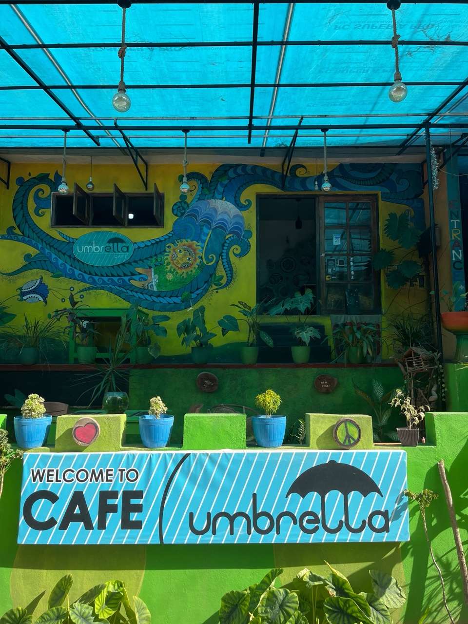 Colorful cafe exterior with murals, Haputale - Haputale food guide