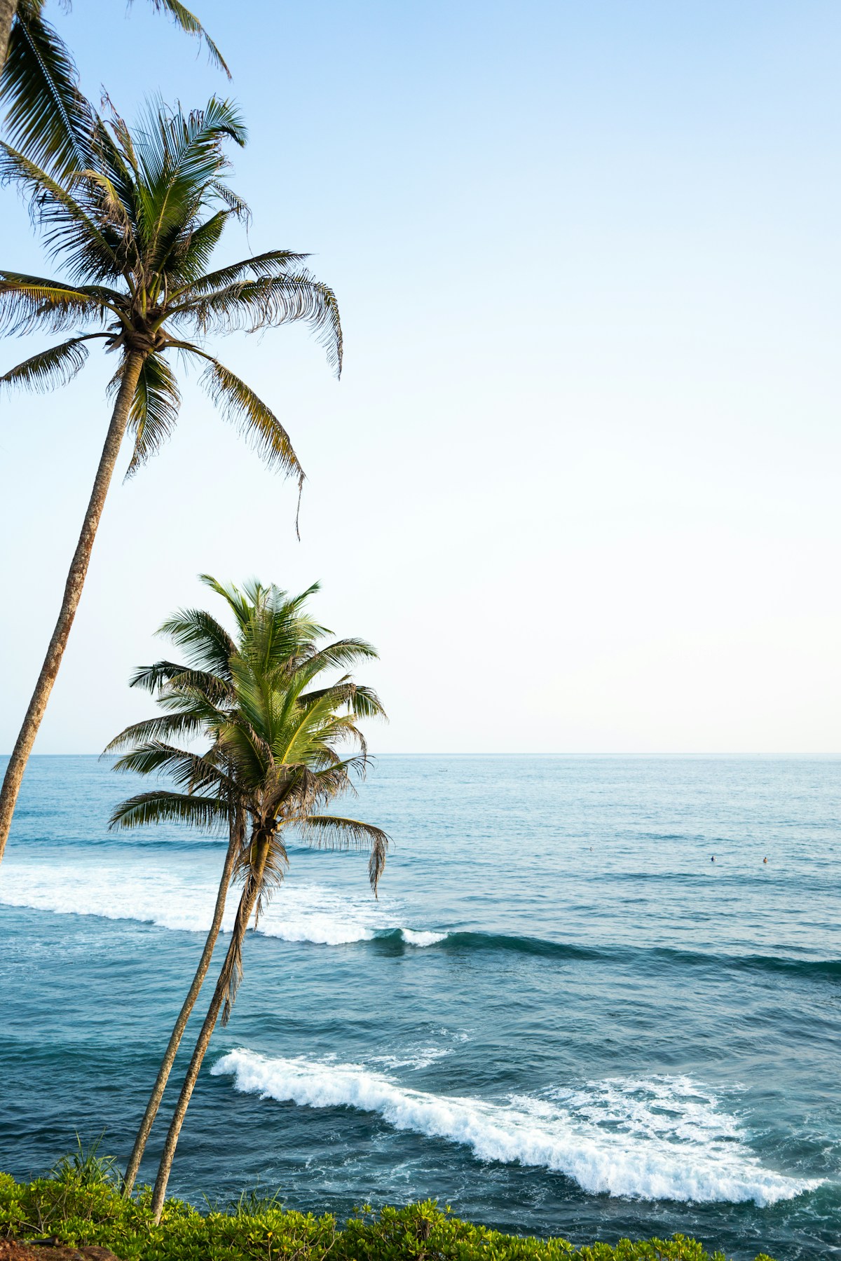 Ocean waves crashing beside Coconut Tree Hill, Mirissa, southern Sri Lanka