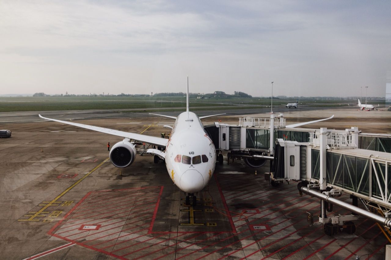 Commercial jet at airport terminal gate - Beijing Capital Airlines restores Colombo direct