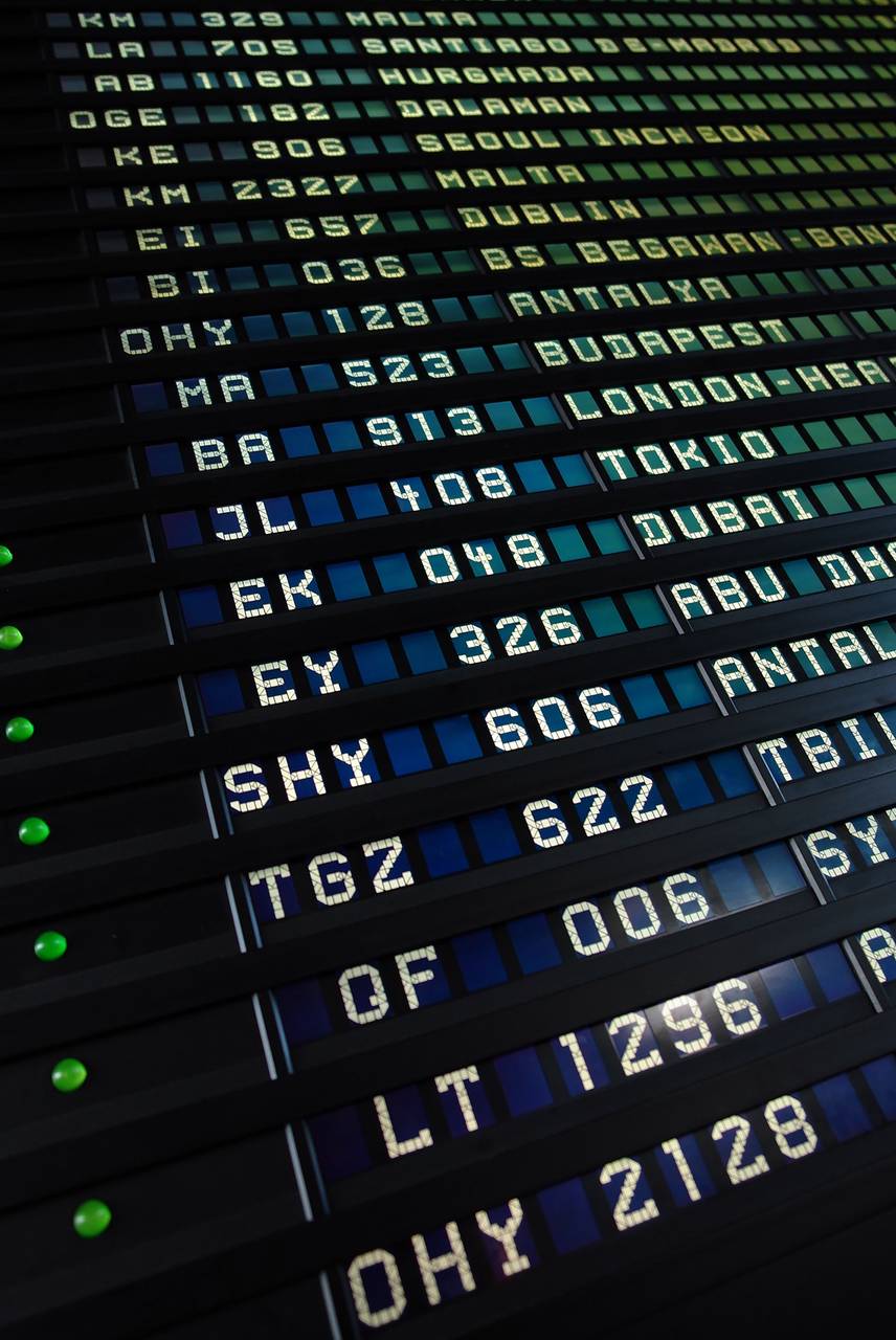 Airport departure board showing flight status - SriLankan Airlines Saudi Arabia suspension October 2026